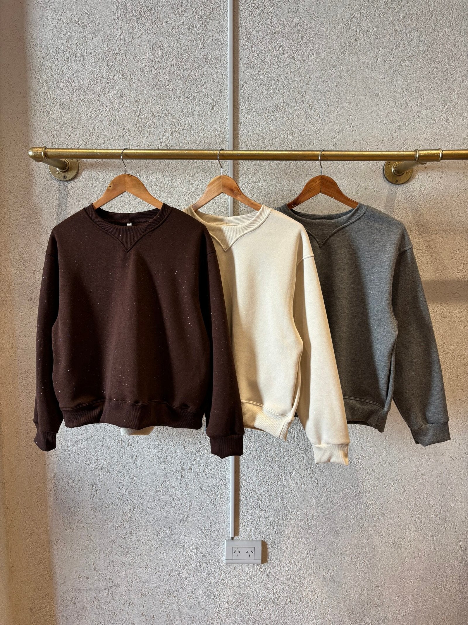 Buzo de algodón con cuello redondo y manga larga en tres colores