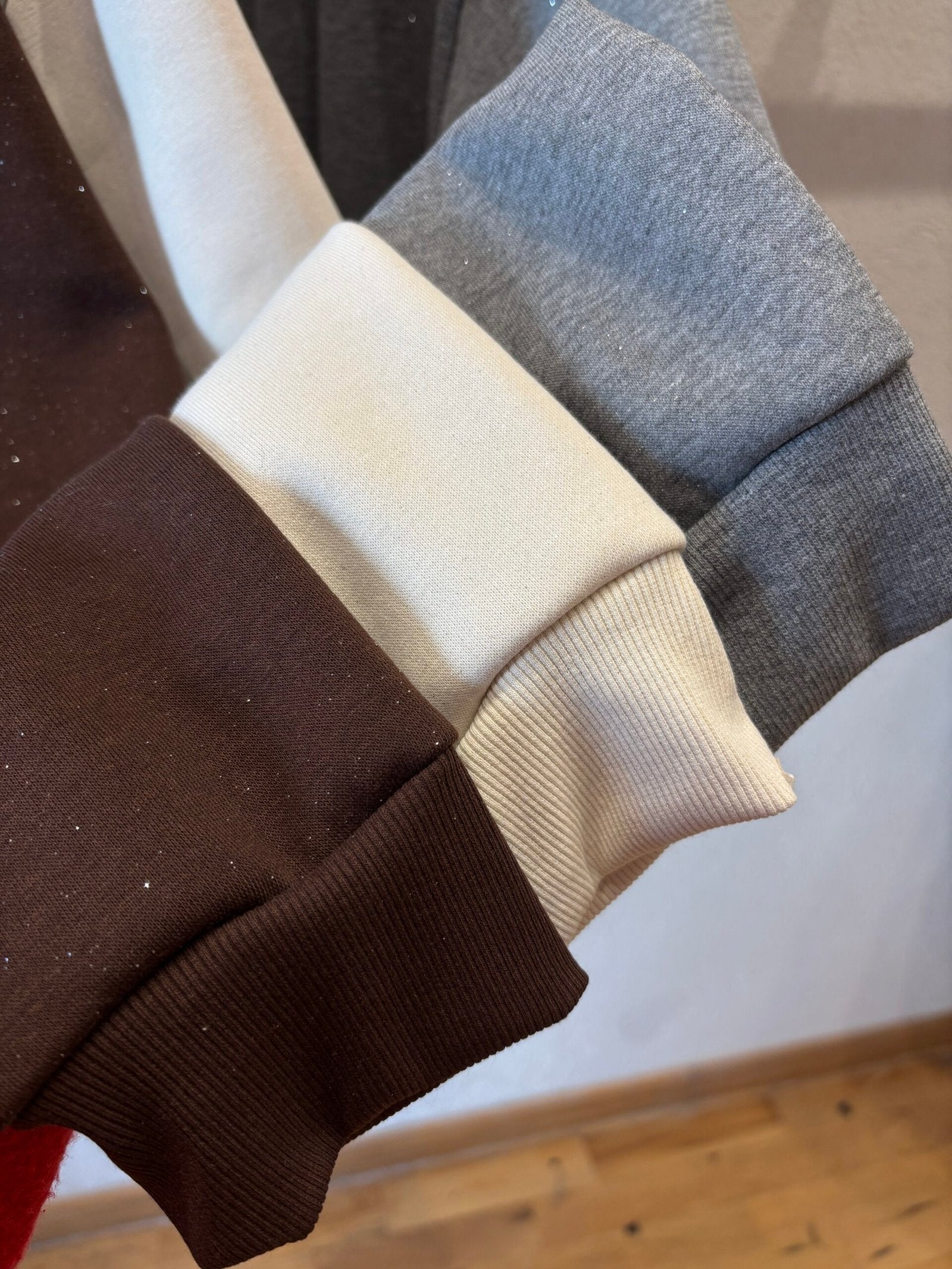 Buzo acanalado con puño elástico en colores variados