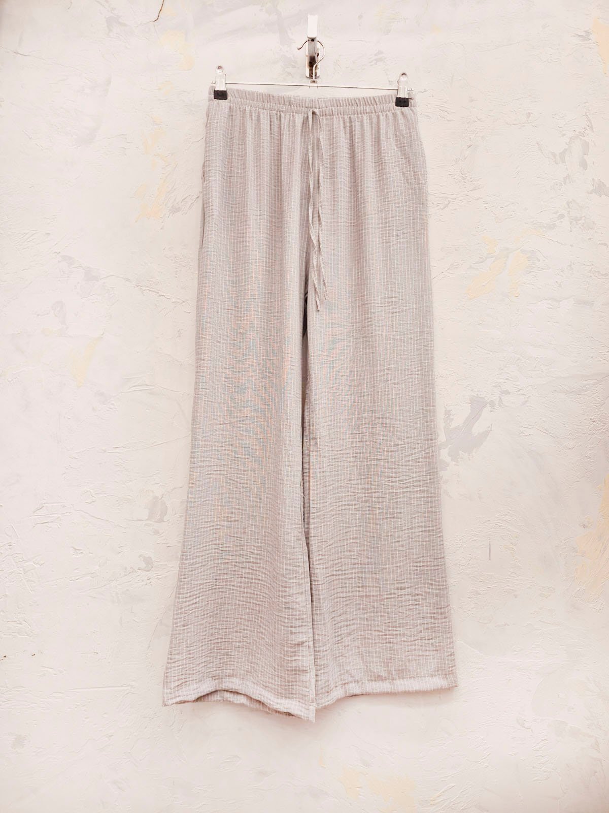 Pantalón acanalado beige claro de tiro alto y pierna ancha