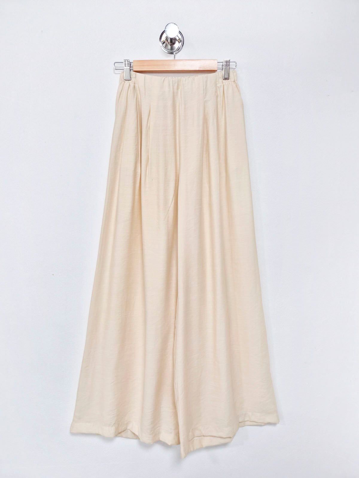 Pantalón palazzo crema de tiro alto y pierna ancha